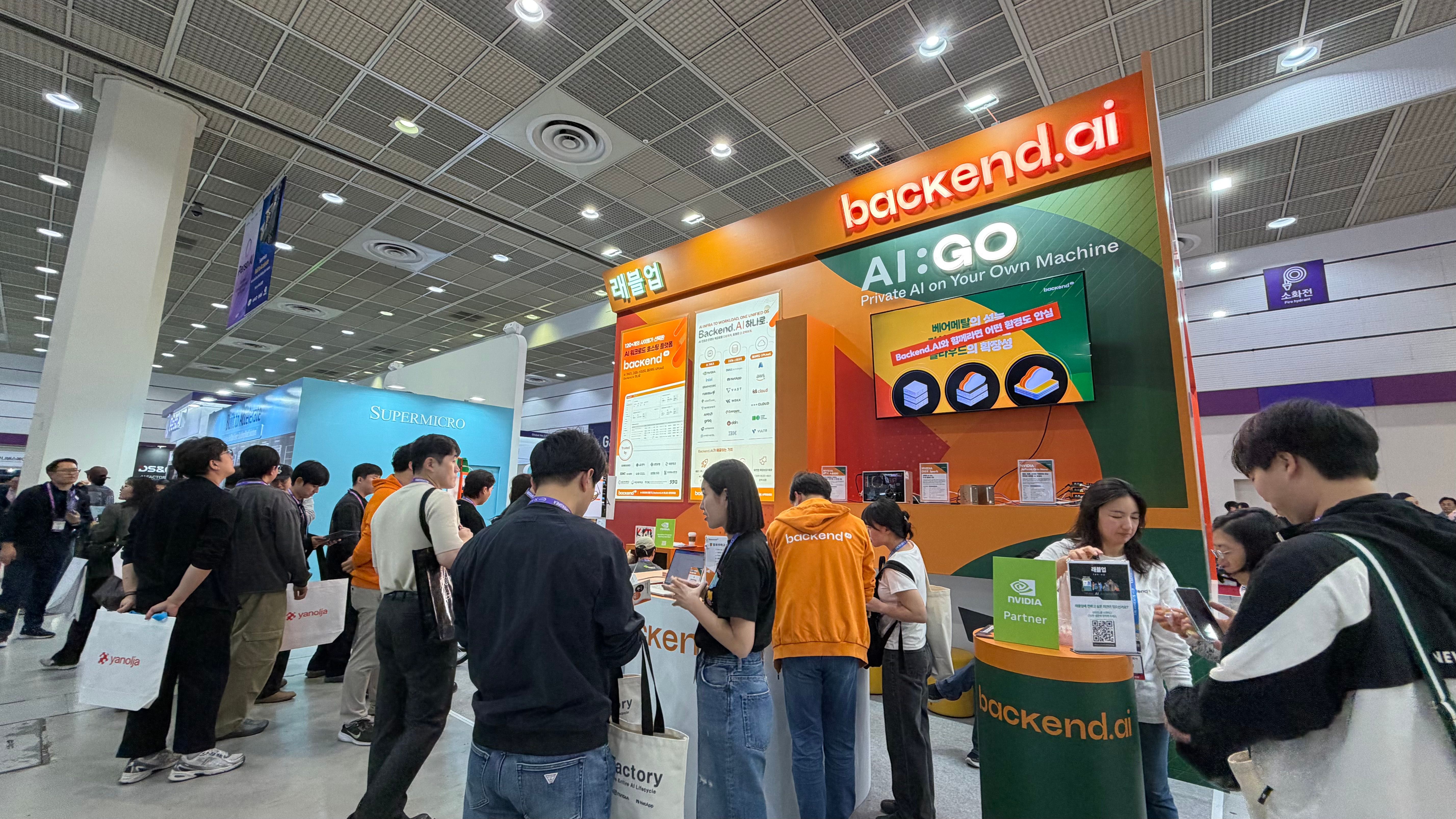 AI EXPO KOREA 2026 at COEX Hall A. Visitors gathered at Lablup booth F04, under the Backend.AI and AI:GO signage.